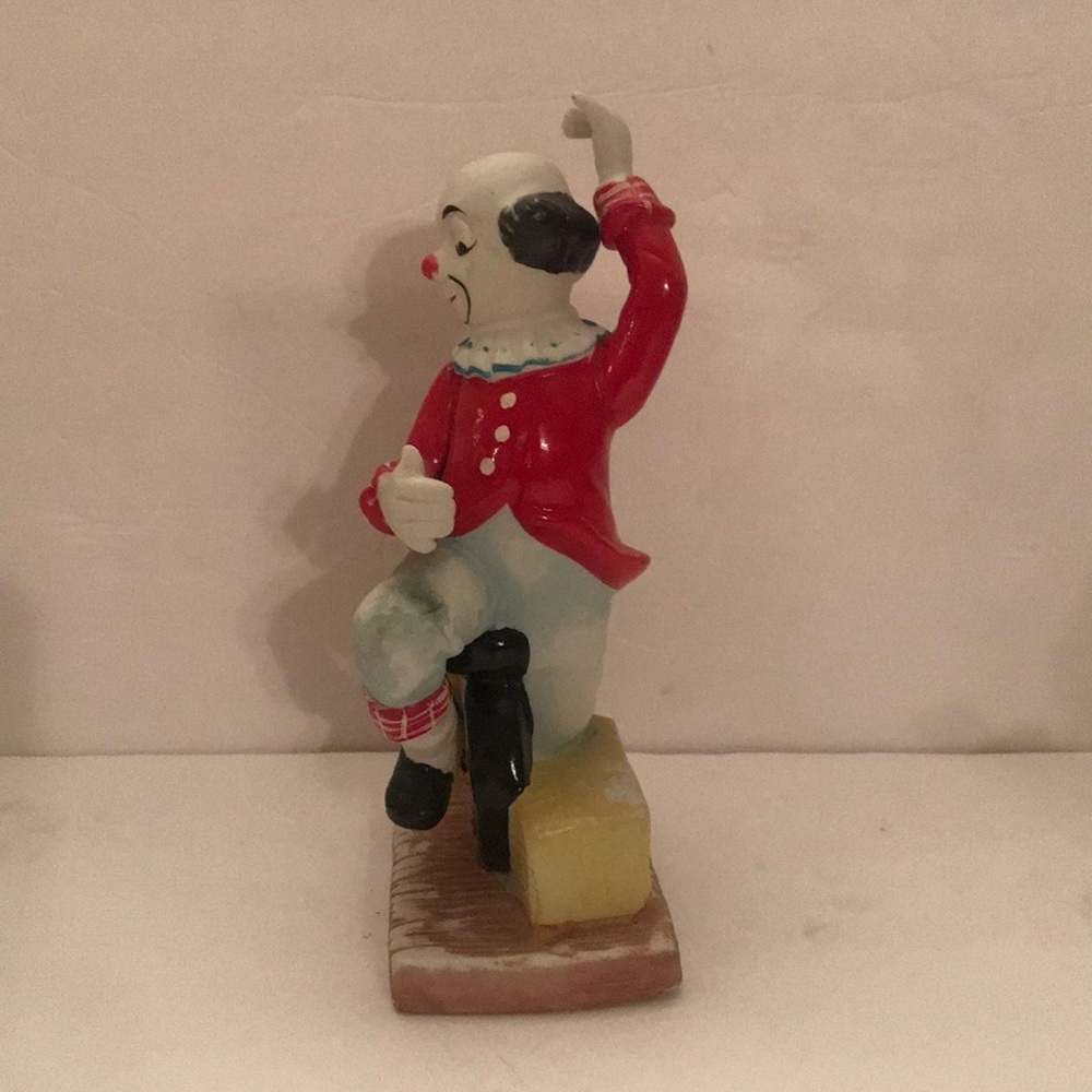 Vintage Clown  Riding Unicycle